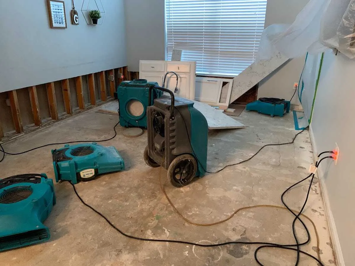 Dehumidifier in flood-cut room for Water Damage Restoration in Parma Heights